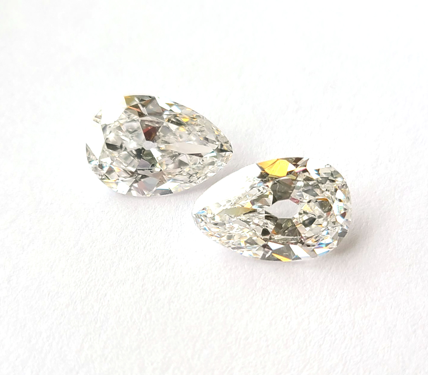Two Unmounted Pear-Cut Colorless Diamond.